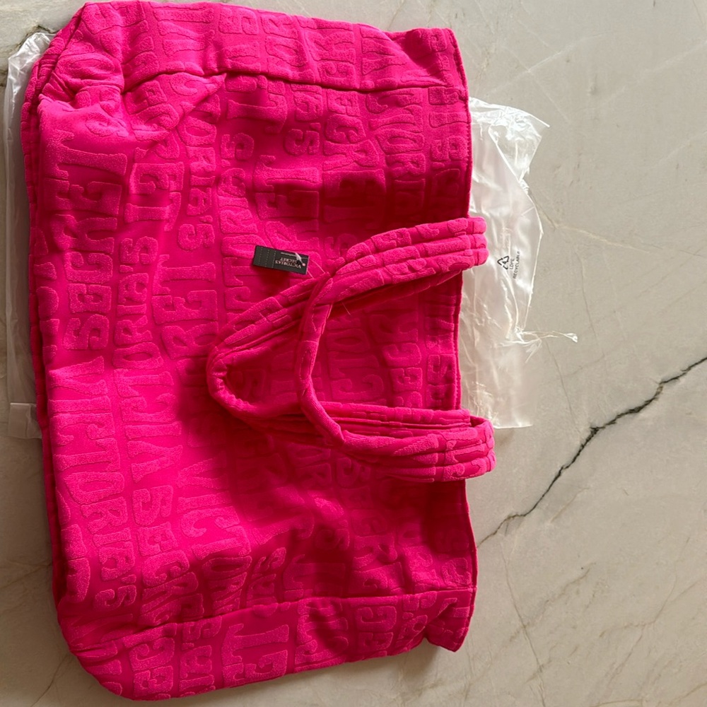 Pink Victoria’s Secret bag.